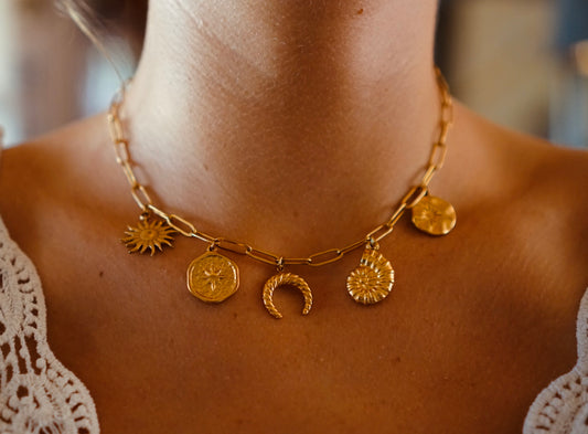 Gold symbol necklace with charms 
