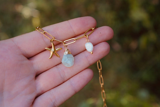 Gold necklace with amethyst and pearl