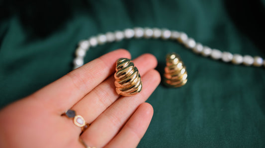 Gold earrings with a textured shape 