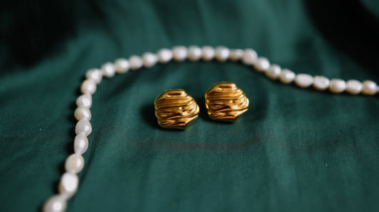 Gold earrings with a classic design